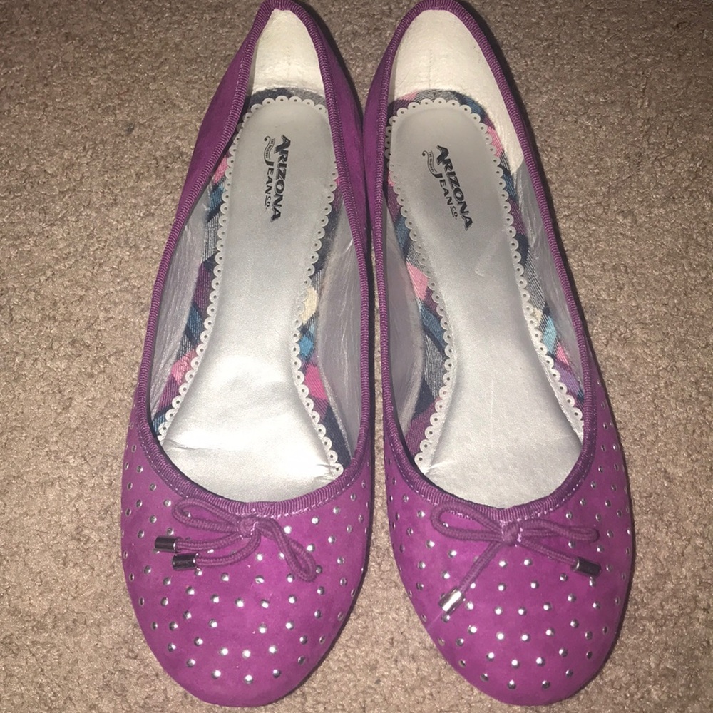 Fuschia colored studded flats